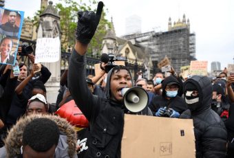 John Boyega proves he’s a hero IRL too at this #BlackLivesMatter protest